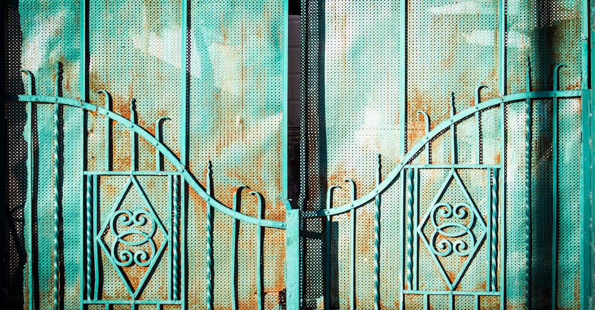 Is it better to paint or stain a wooden gate?